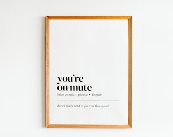 May include: A framed print with a white background and black text that reads "you're on mute [joər on mju:t] phrase - English do we really need to go over this again?"
