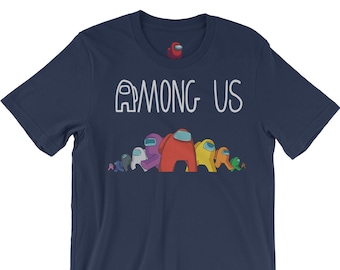 May include: A navy blue t-shirt with a white outline of an Among Us character and the text "Among Us".  A line of colorful Among Us characters are walking across the bottom of the shirt.