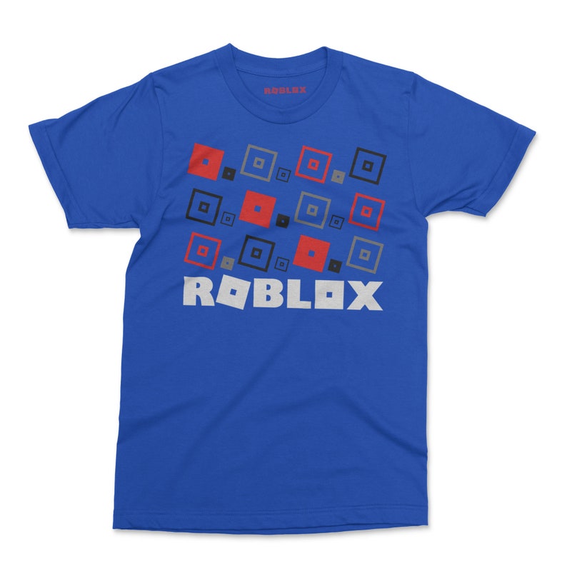 May include: A royal blue t-shirt with a white "ROBLOX" logo and a pattern of red, black, and gray squares.