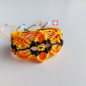 Handmade, yellow / orange / brown, wide macrame bracelet