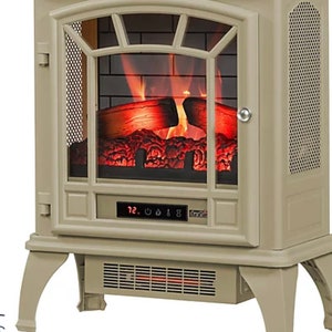 Könnte beinhalten: Ein beigefarbener Elektro-Kamin mit realistischem Flammeneffekt und digitalem Display. Der Kamin hat einen schwarzen Metallrost und eine Glastür. Der Kamin ist 39,1 cm hoch, 28,7 cm tief und 52,6 cm breit.