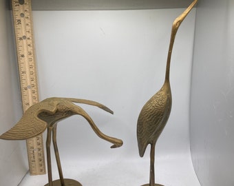 Brass Cranes statues