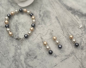 Pearl jewellery set. necklace, earrings and bracelet.  Handmade with love for that special occassion.