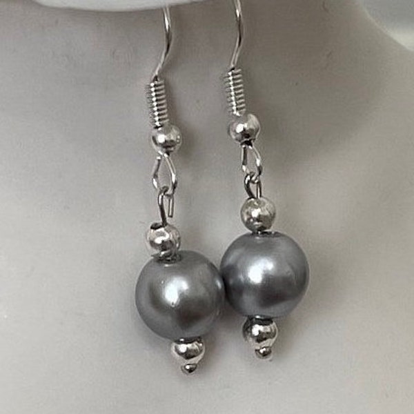 Grey pearl drop earrings. Sterling silver ear hook with single pastel grey Pearl dangle drop.