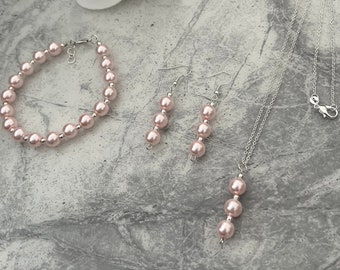 Pink pearl set. necklace, earrings and bracelet.  Handmade with love for that special occassion.