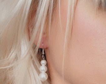 Cream pearl earrings. Baroque classic triple pearl dangle drop, weddings, bride, bridesmaids.