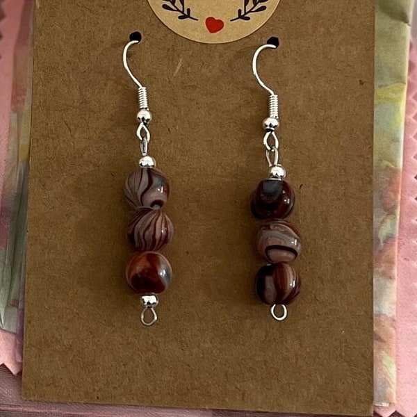 Brown beaded dangle drop earrings. Sterling silver ear hook with a beaded brown design. Free gifting wrapping.