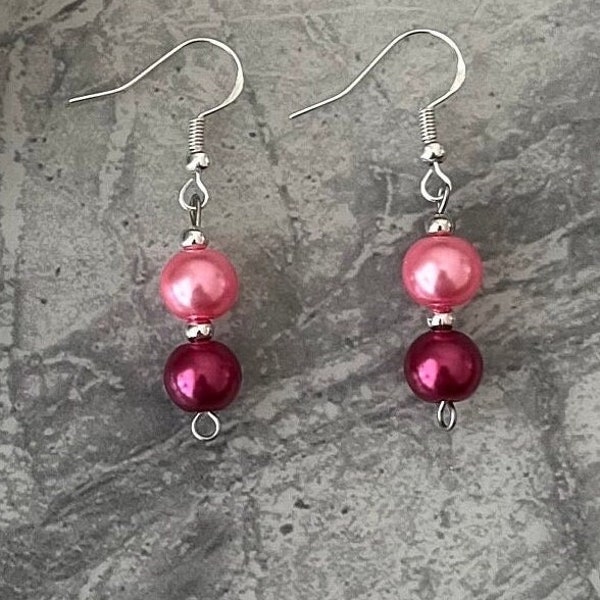 Pink pearl drop earrings on a sterling silver ear hook. Gift wrapped.