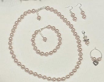 Pink pearl set. necklace, earrings and bracelet.  Handmade with love for that special occassion.