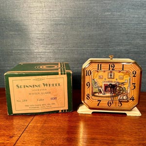 Reloj despertador de 30 horas con rueca giratoria de lujo, años 30/40, con caja original y documentación.