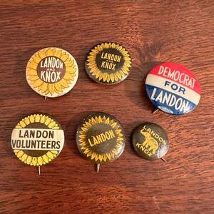 May include: Six vintage political campaign buttons featuring a sunflower design and the text "Landon and Knox" or "Landon" with the words "Democrat for Landon" on one button.