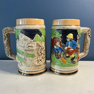 A Vintage Pair of Lusterware Ceramic Beer Steins