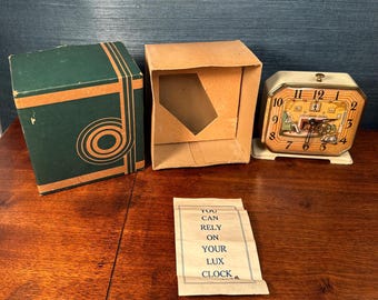 Vintage Lux Spinning Wheel Alarm Clock: 1930s Animated Americana