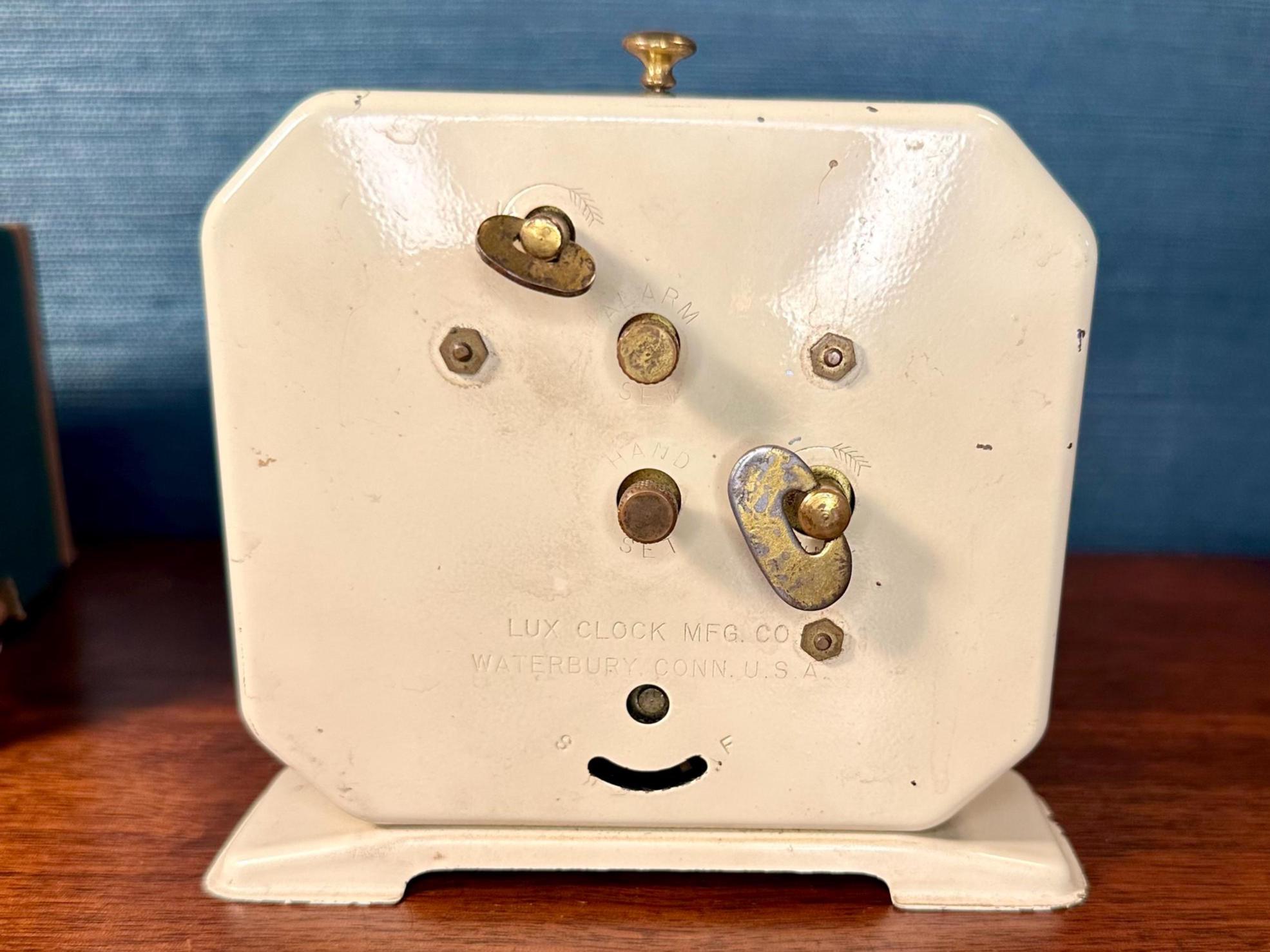 Vintage Lux Spinning Wheel Alarm Clock: 1930s Animated Americana