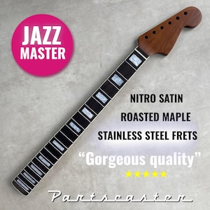 May include: A roasted maple guitar neck with a nitro satin finish and stainless steel frets. The neck has white dot inlays and the text "Jazz Master" is visible in the background.