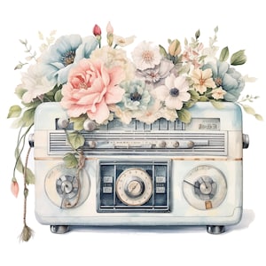 May include: A vintage-style radio in a pale blue finish, adorned with a large arrangement of watercolor-style flowers in shades of pink, white, and soft blue. The radio features a central circular dial, two side knobs, and a horizontal frequency display.