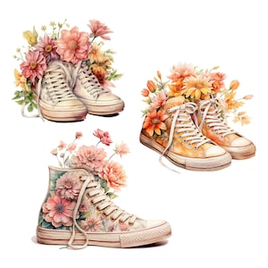 Op de afbeelding: Drie paar witte canvas high-top sneakers met bloemenaccenten. De bloemen zijn in tinten roze, oranje en geel.