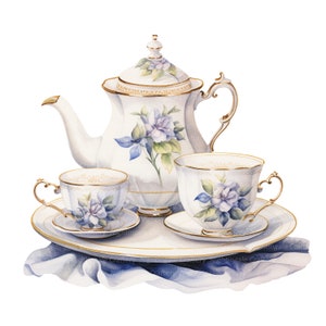 Peut inclure: Une th&eacute;i&egrave;re blanche avec des motifs floraux bleus et des accents dor&eacute;s, accompagn&eacute;e de deux tasses &agrave; th&eacute; et soucoupes assorties, le tout dispos&eacute; sur un plateau blanc avec un bord dor&eacute;, reposant sur un tissu bleu.