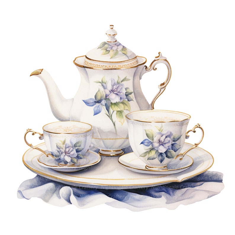 Peut inclure: Une th&eacute;i&egrave;re blanche avec des motifs floraux bleus et des accents dor&eacute;s, accompagn&eacute;e de deux tasses &agrave; th&eacute; et soucoupes assorties, le tout dispos&eacute; sur un plateau blanc avec un bord dor&eacute;, reposant sur un tissu bleu.