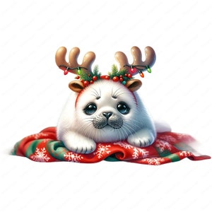 May include: A white seal wearing a red and green reindeer headband with lights, lying on a red and green blanket with snowflakes.