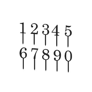 Könnte beinhalten: Schwarze Tortendekorationen mit den Zahlen 1 bis 10. Die Zahlen sind in einer dekorativen Schreibschrift.