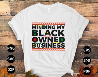 May include: White t-shirt with the text "Minding My Black Owned Business" in black, green, red, and yellow. The design includes decorative red and yellow cross-stitch patterns.