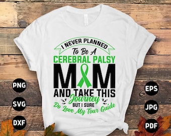 May include: White t-shirt with a green ribbon and black text that reads "I never planned to be a Cerebral Palsy M&M and take this journey but I sure do love my tour guide."