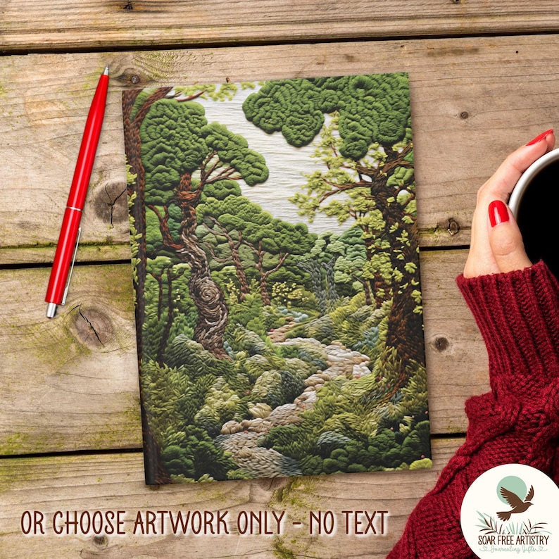 Woodland Wanderer, dark green forest aesthetic journal is displayed on a rustic table, next to a woman cupping her coffee, showcasing the non-customized, artwork only, option of this journal, where there is no text added.