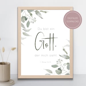 Könnte beinhalten: Ein druckbarer Wandkunstdruck mit weißem Hintergrund und grünen Aquarellblättern. Der Text lautet "Du bist ein Gott, der mich sieht. 1. Mose 16,13".