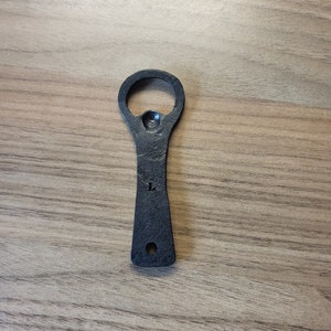 Hand forged bottle opener