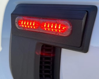 Whelen® Ion T-series Lighthead Mount Fender Vent Badge (pair