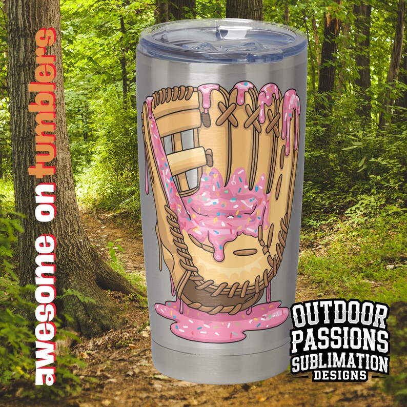 May include: A stainless steel tumbler with a pink and white donut-shaped baseball glove graphic. The graphic has sprinkles and pink icing dripping down the side of the glove. The tumbler is a sublimation design.