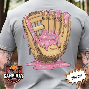 May include: A baseball mitt covered in pink frosting and sprinkles. The frosting is dripping down the sides of the mitt. The mitt is on a gray background.