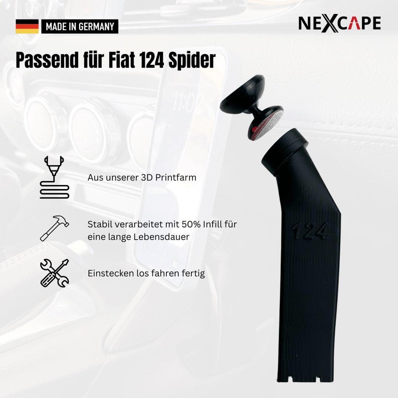 May include: A black 3D-printed car phone mount for a Fiat 124 Spider, featuring the number 124 embossed on the side. The mount includes a separate magnetic attachment piece with a circular base and a textured adhesive surface for device mounting.