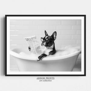 May include: A black and white photo of a dog wearing glasses and reading a newspaper while sitting in a bathtub full of bubbles.