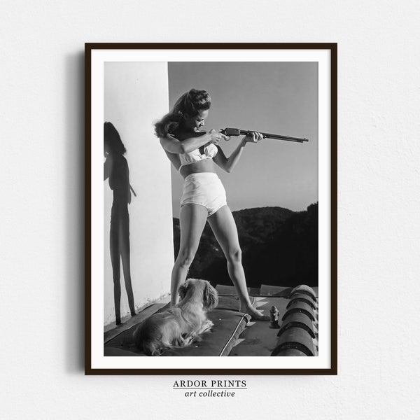 Woman With Dog Aims Rifle Wall Art | Black and White Print | Vintage Dona Drake Poster | Old Hollywood Photo | Funny Retro Wall Decor