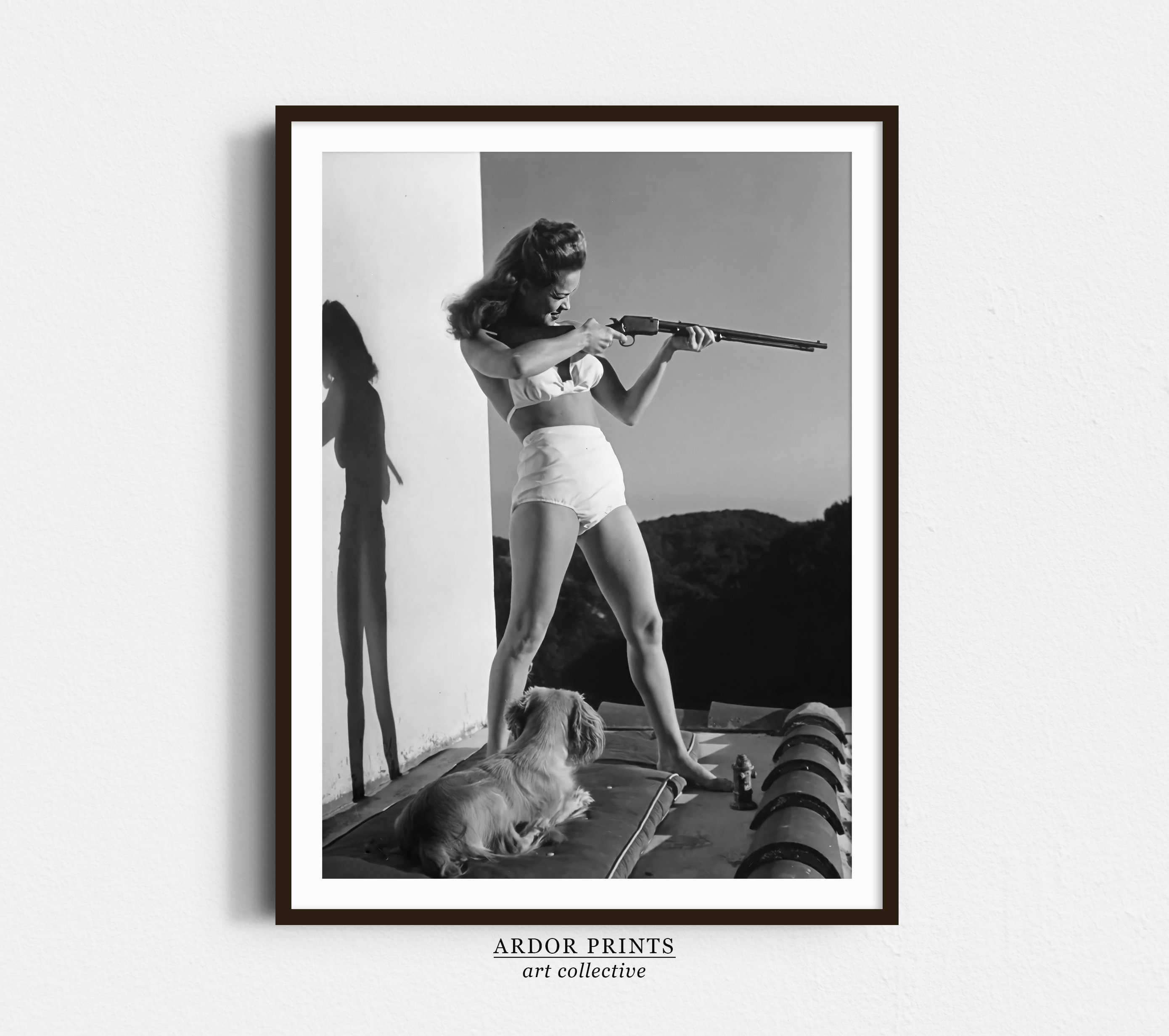 Vintage Woman with Rifle & Dog Print: Retro Wall Art for Bar, Funny Man Cave Decor, Old Hollywood Photo - Black and White Print