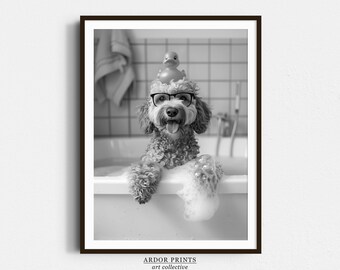May include: A black and white photo of a dog wearing glasses and a rubber ducky on its head. The dog is in a bathtub with bubbles. The photo is framed with a black frame and has the text "ARDOR PRINTS art collective" at the bottom.