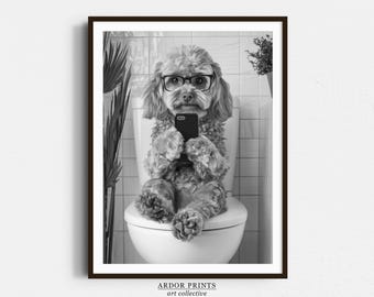 May include: A black and white photo of a dog wearing glasses and sitting on a toilet, holding a smartphone.