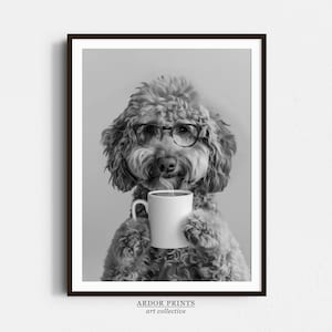 May include: A black and white photo of a dog wearing glasses and holding a cup of coffee. The dog is a poodle with curly hair and a serious expression.