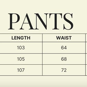 May include: A size chart for trousers, with the word "PANTS" at the top. The chart displays sizes S, M, and L, with corresponding measurements for length, waist, and hips in centimetres.