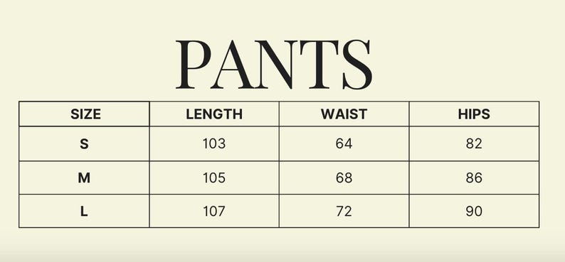 May include: A size chart for trousers, with the word "PANTS" at the top. The chart displays sizes S, M, and L, with corresponding measurements for length, waist, and hips in centimetres.