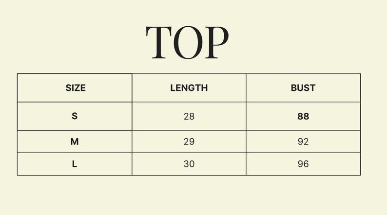 May include: A cream-colored graphic with the word "TOP" at the top. Below, a table displays sizes S, M, and L, with corresponding length measurements of 28, 29, and 30 inches, and bust measurements of 88, 92, and 96.