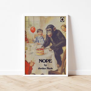 May include: A framed print featuring a vintage illustration of a chimpanzee at a birthday party. The chimp is reaching for a cake on a table. The word "NOPE" is printed in large letters, with "by Jordan Peele" below.