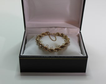 14 Karat Gold Charm Bracelet