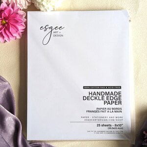 May include: A pack of 25 sheets of 8x10 inch handmade, deckle edge paper. The paper is 100% cotton rag and acid-free. The paper is made in France and is perfect for stationery, art, and more.