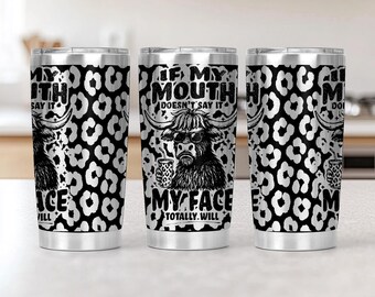 May include: Three stainless steel tumblers with a black and white leopard print pattern. Each tumbler features a Highland cow graphic wearing sunglasses and holding a cup. Text on the tumblers reads "If my mouth doesn't say it, my face totally will."