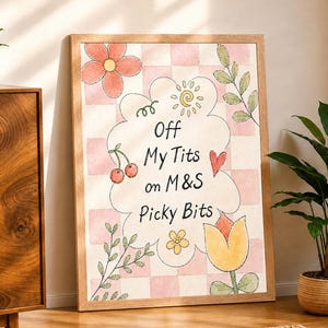 May include: A framed wall art print featuring a pink and white checkered background with a central cloud shape containing the text Off My Tits on M&S Picky Bits, surrounded by hand-drawn illustrations of flowers, cherries, and a small sun.