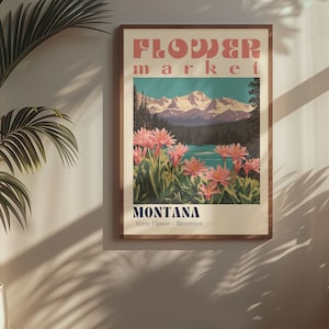 Puede incluir: Un póster de estilo vintage con el texto "FLOWER market" en una fuente retro. El póster presenta un paisaje escénico con montañas, un lago y flores rosas. El texto "MONTANA State Flower - Bitterroot" está en la parte inferior del póster.