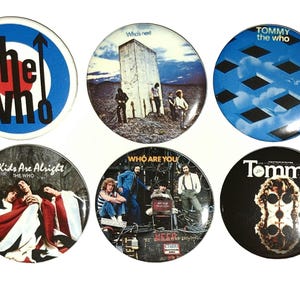May include: A collection of six circular badges showcasing The Who. Designs include the band's logo, album art from "Who's Next," "Tommy," and "Who Are You," and the text "The Kids Are Alright." Each badge is approximately 3.8 cm in diameter.